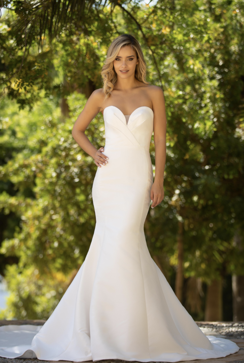 Designed for the modern romantic, this strapless fit-and-flare gown features a soft satin finish, a flattering sweethear
