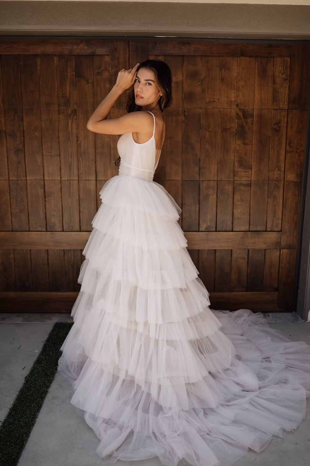 Available with or without overskirt. This gown combines shimmering pink tulle, ethereal glitter tulle, and champagne tul
