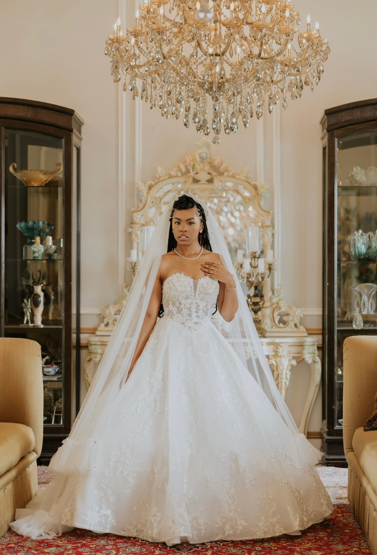 A breathtaking ball gown for the bride who dreams in lace and sparkle. This strapless gown features a structured bodice,