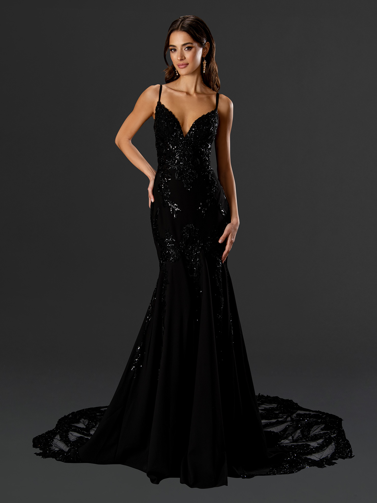 For the bride who dares to be different. This stunning black sequin gown blends bold sophistication with red-carpet glam