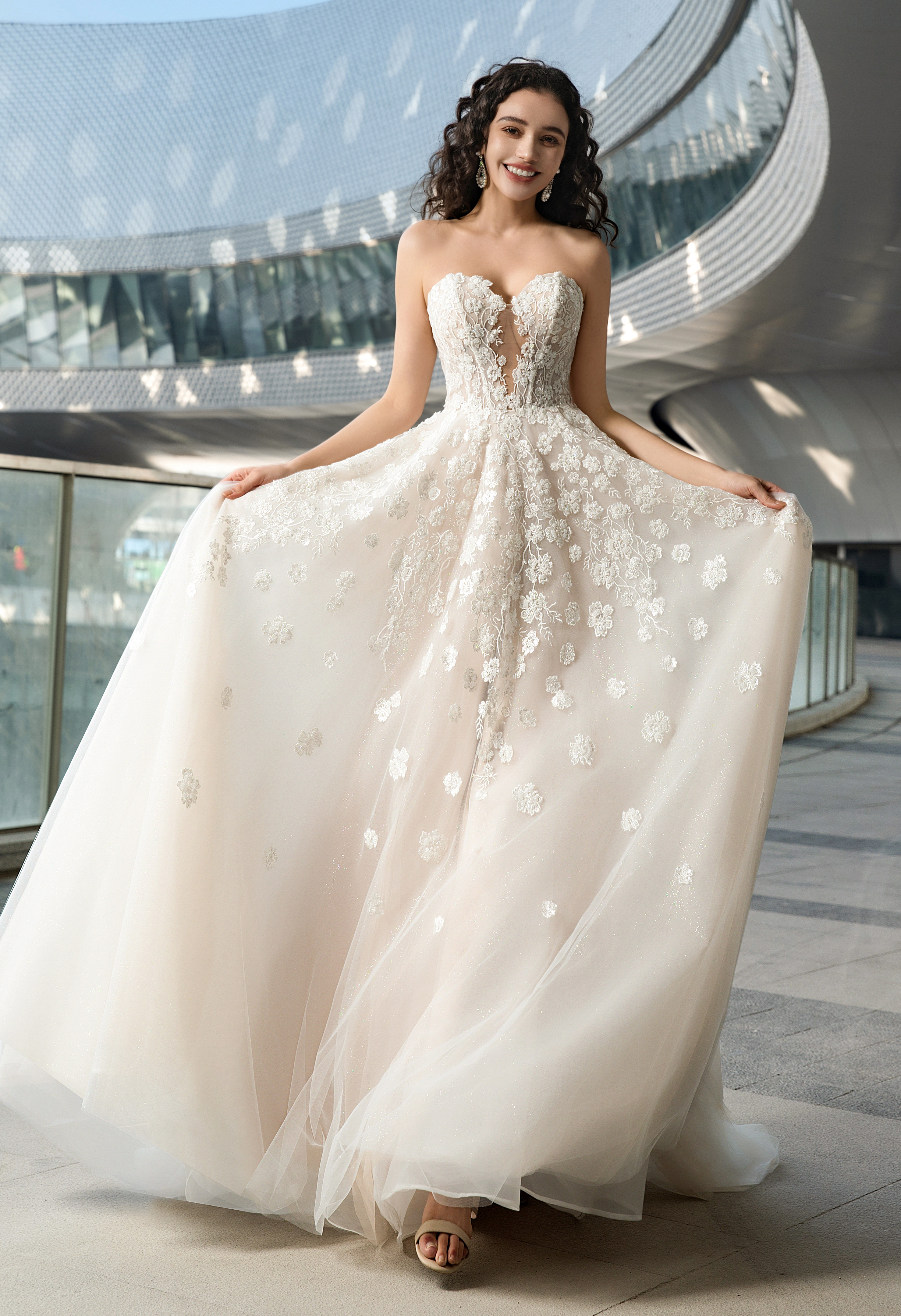 3D floral lace and a tulle skirt make this strapless gown a blooming masterpiece for romantic San Antonio brides. #Weddi