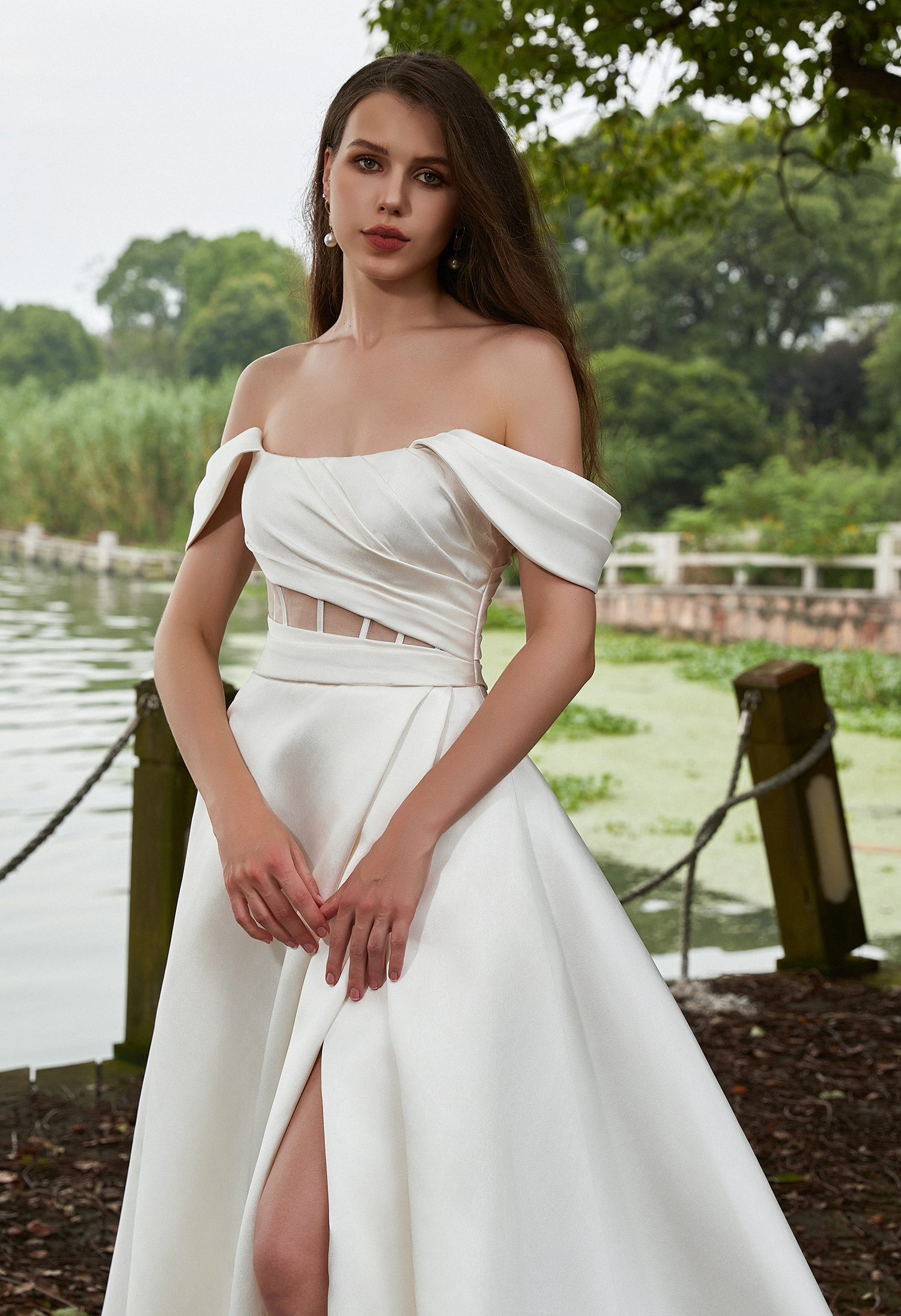 Clean satin lines, corset waist, and thigh slit blend sophistication and allure—perfect for minimalist brides. #WeddingD