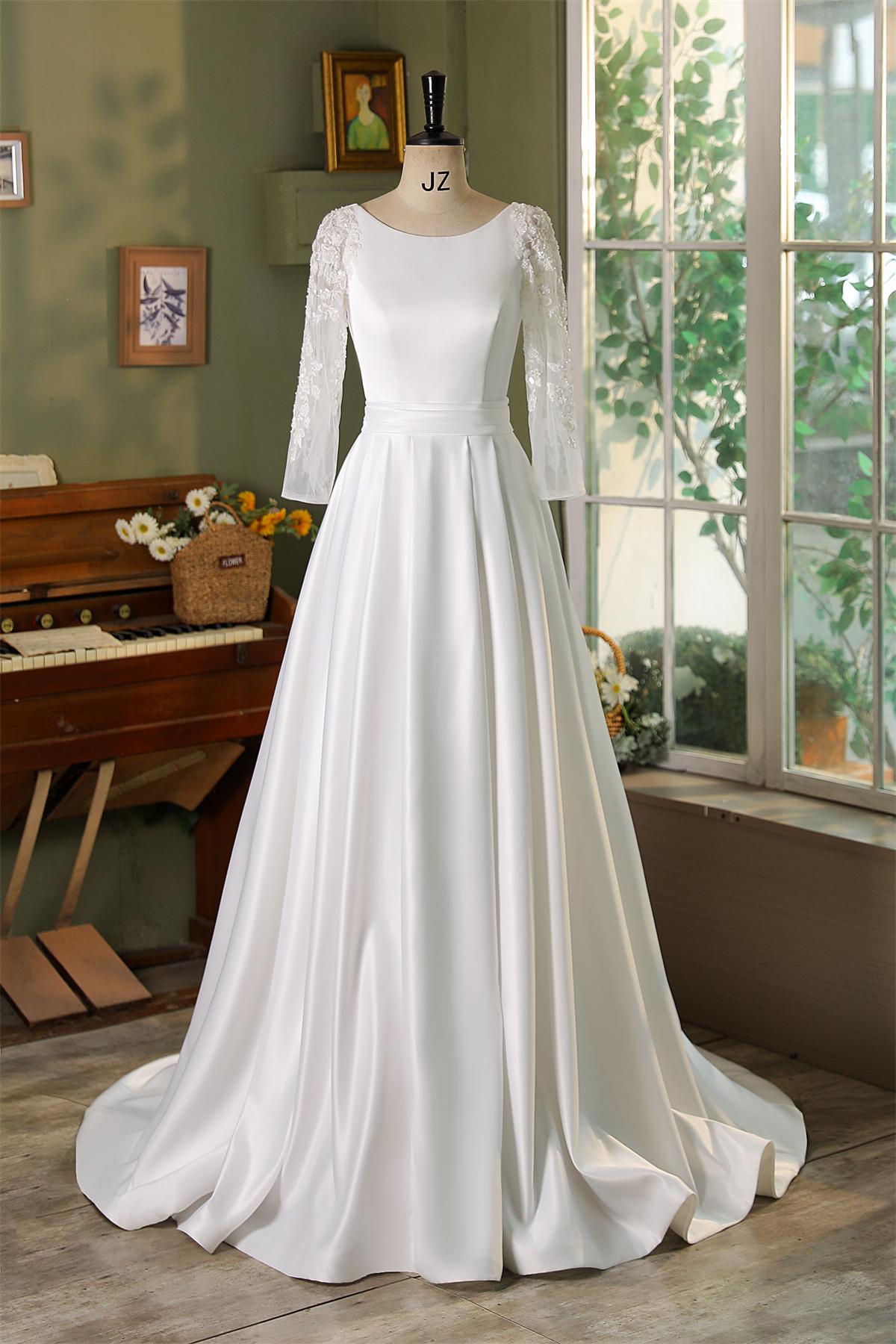Embrace timeless elegance in this stunning A-line bridal gown, where the luxurious satin fabric flows gracefully to the 