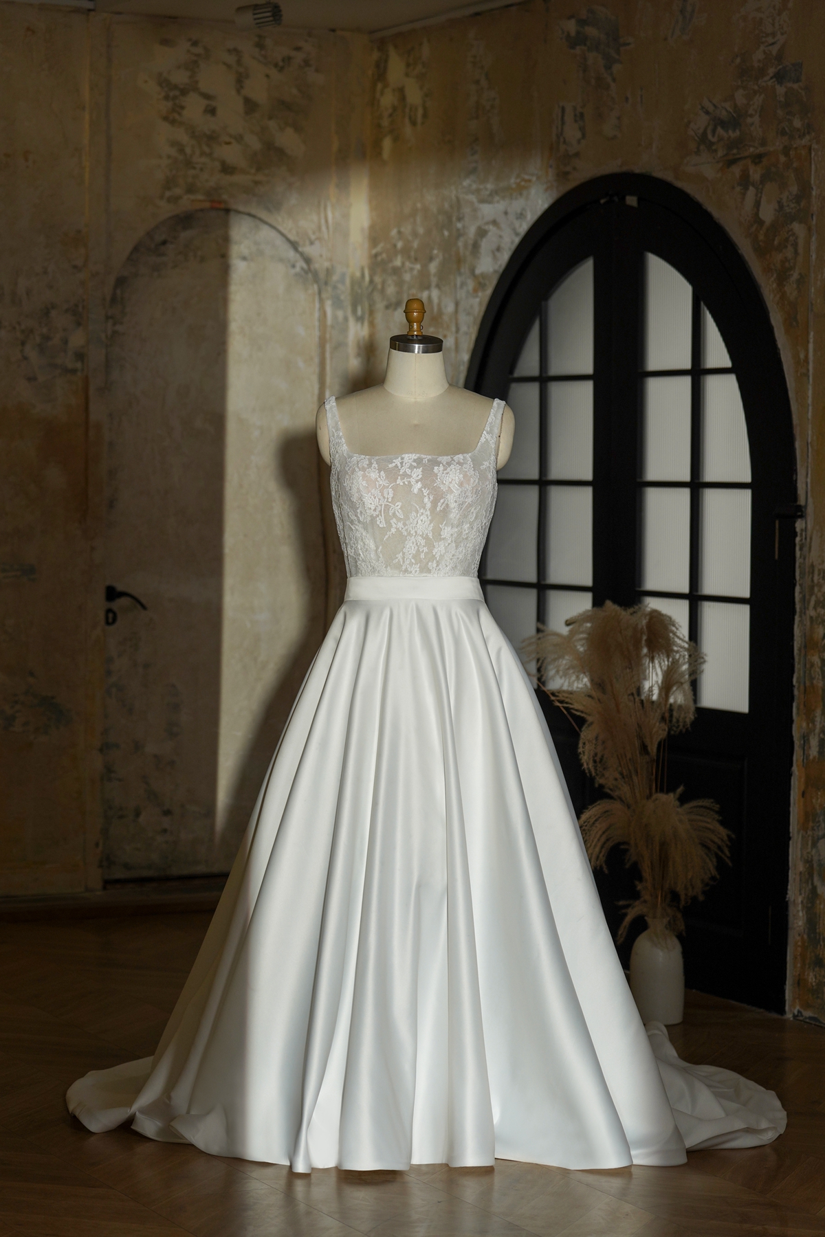 Embrace elegance in this stunning A-line bridal gown, where modern sophistication meets timeless charm. The satin skirt 