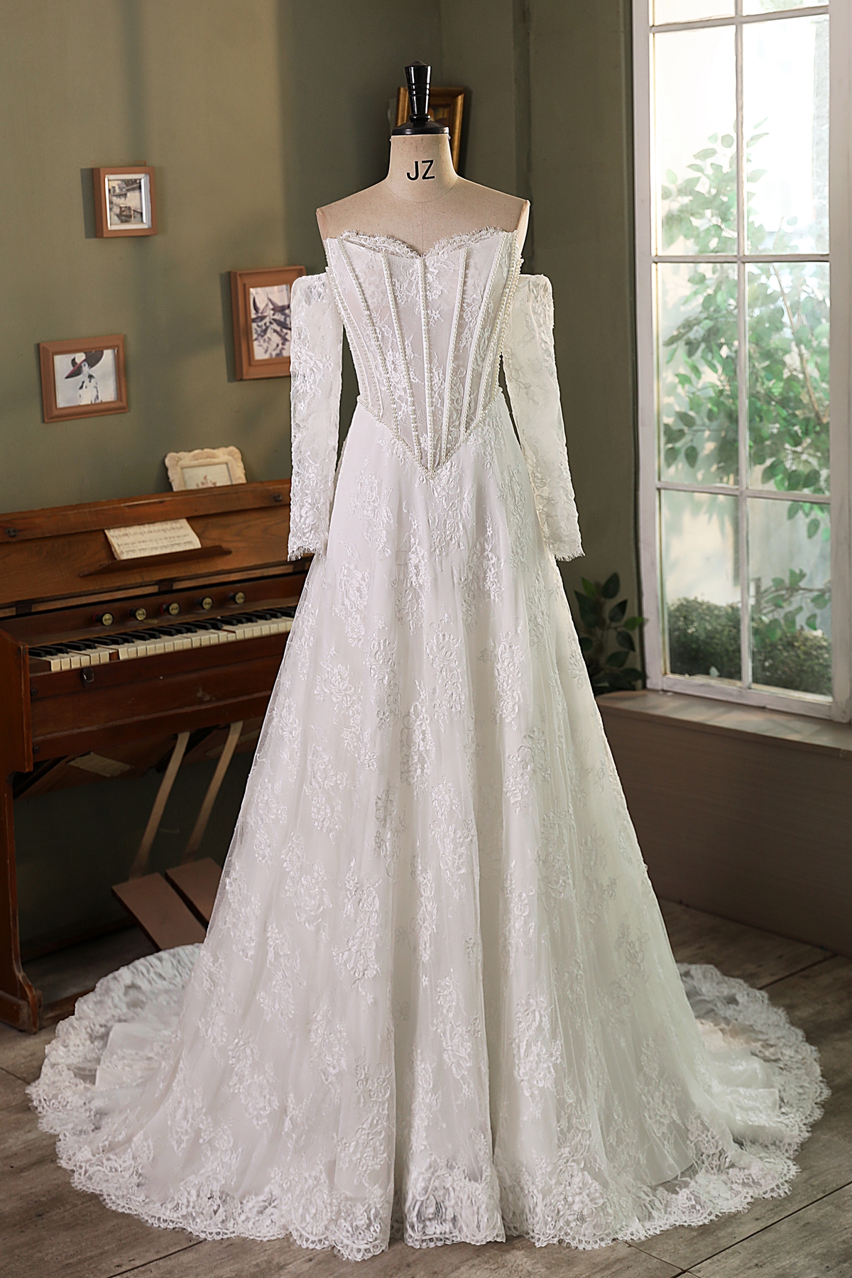Embrace a fairytale romance in this stunning A-line wedding dress that masterfully combines elegance and whimsy. Crafted
