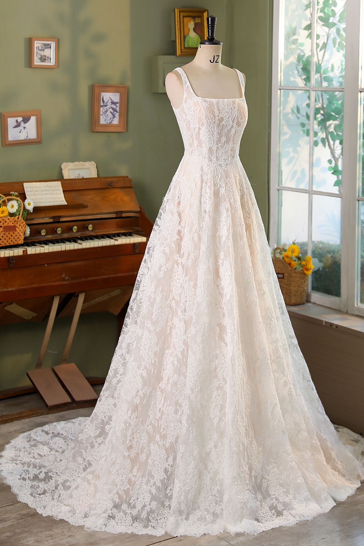 Embrace your fairytale moment in this exquisite A-line gown, featuring delicate lace that dances with light. The enchant