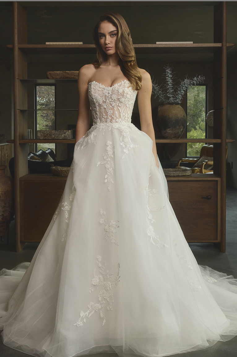 Embrace your fairy tale in this stunning A-line wedding dress that beautifully blends romance with modern elegance. The 