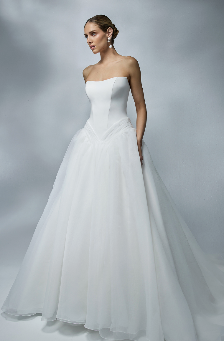Embrace your inner princess in this breathtaking strapless A-line wedding dress, a perfect blend of modern elegance and 