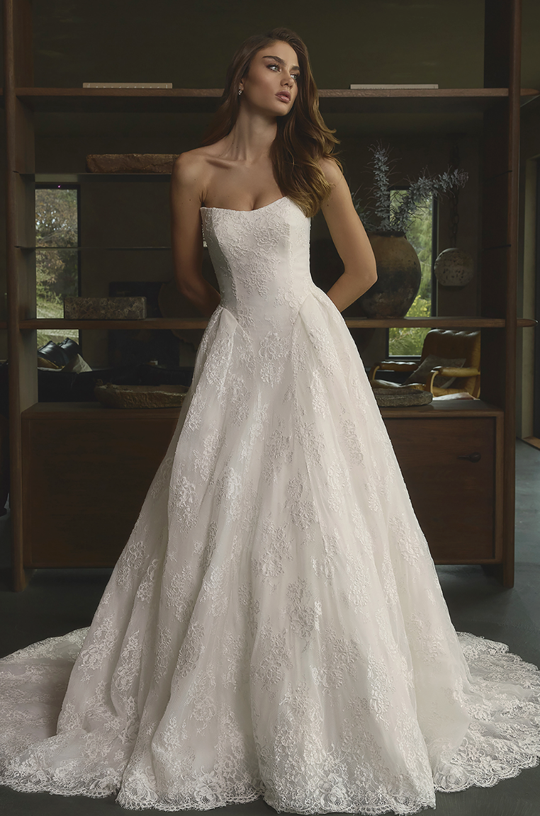 Embrace your fairytale moment in this exquisite A-line wedding dress, beautifully crafted with intricate lace detailing 